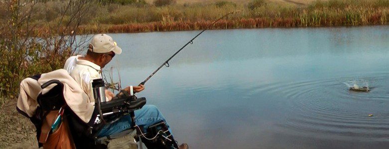 Kary fishing by a beautiful lake