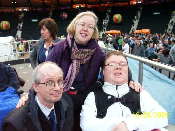 Robert Watson and his parents at a Coldplay concert in 2009