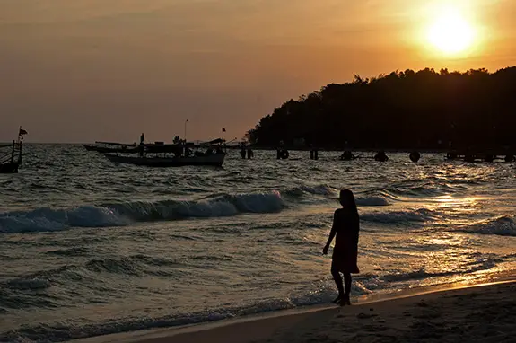 Travelling with Ehlers Danlos Syndrome Helen by a beach in Cambodia