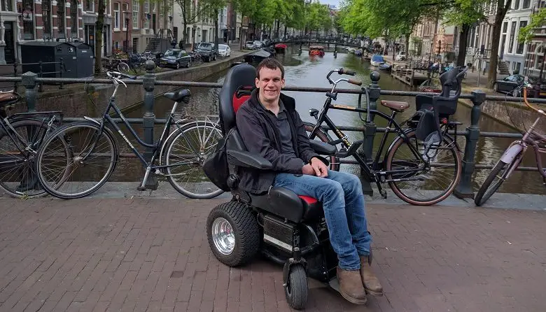 Alex in Freedom One power wheelchair