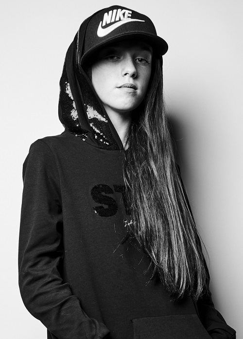 Disabled model Isabella Neville in hoodie