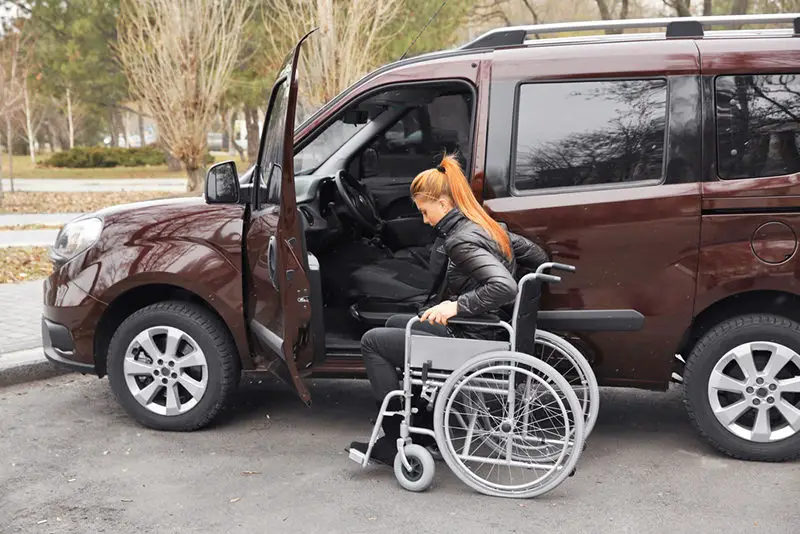 Person getting into an accessible car