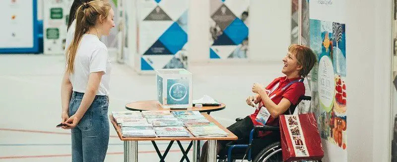 disabled woman volunteering