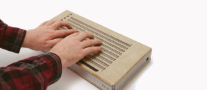 Canute Braille e-reader being used