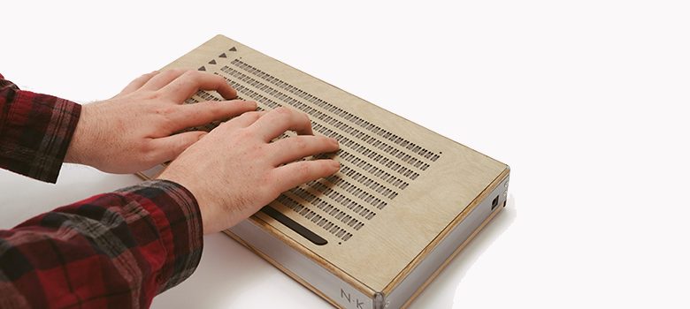 Canute Braille e-reader being used