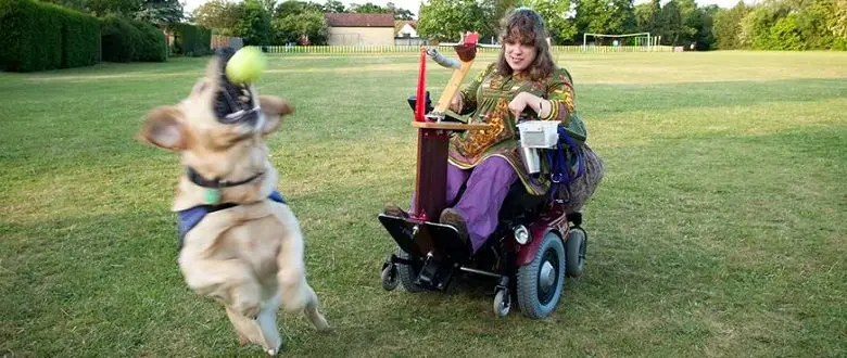 Lady in wheelchair with dog