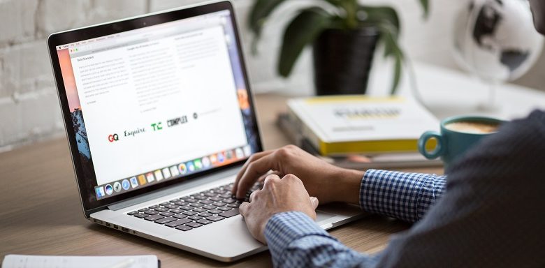 Working on a laptop in an office