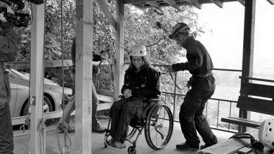 Carrie Ann abseiling in a wheelchair