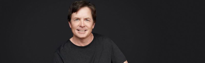 Disabled celebrity Michael J Fox portrait image on black background