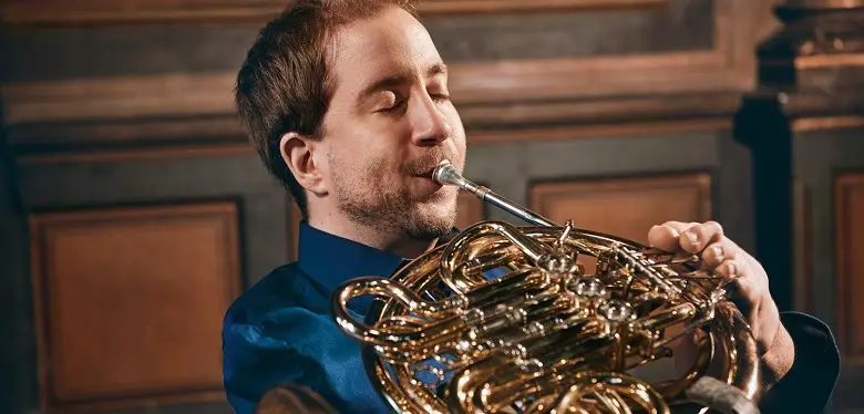 Disabled musician Felix Klieser playing an instrument with his feet