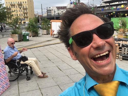 Wolf in his wheelchair and a street performer in Bahnhof Friedrichstraße Berlin
