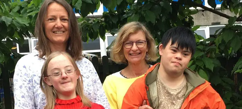 Jane Chong and Jane Kippax with their children who have Down's syndrome