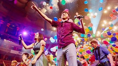 Music for Youth performing with lots of balloons on stage