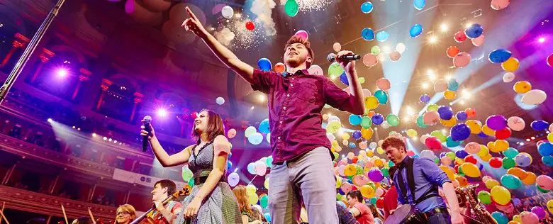 Music for Youth performing with lots of balloons on stage