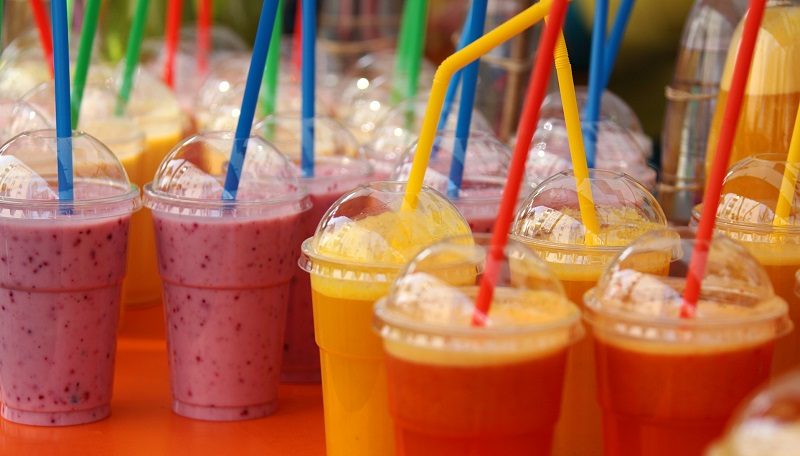 Lots of smoothies with plastic straws