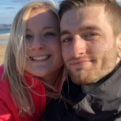 Dan and Becky on a beach