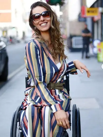Samata Bullock in her wheelchair in the street
