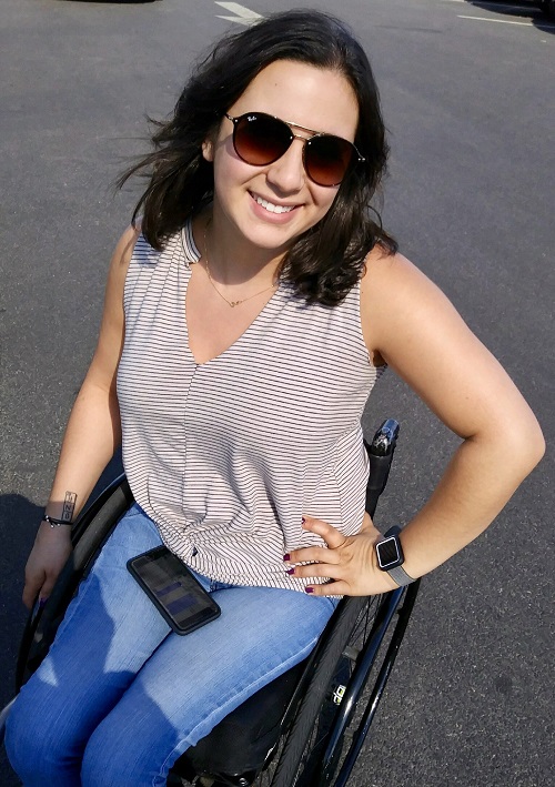 Trainee audiologist Oliva in her wheelchair