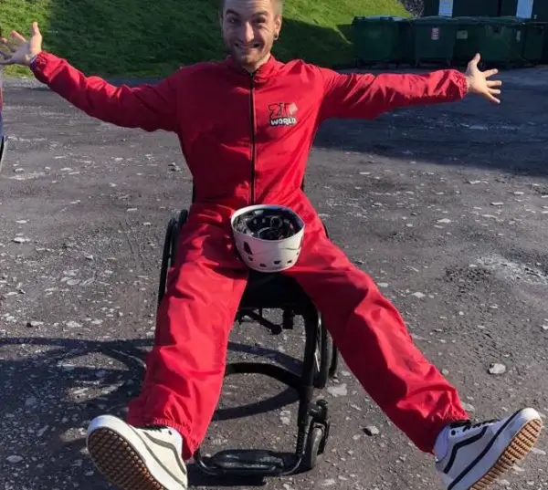 Dan in his wheelchair waiting to go on a zipline