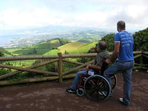 Wheelchair user looking at view on Azores island