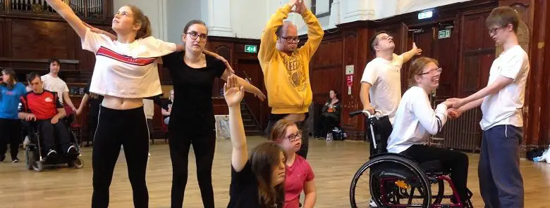 A group of disabled people doing drama