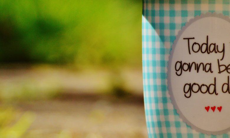 Coffee cup with words 'today is going to be a good day' on them