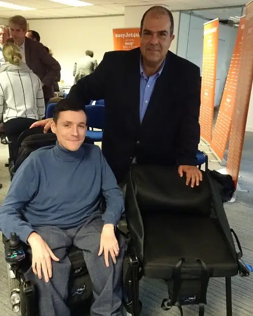 Disabled entrepreneur Josh with Sir Stellios
