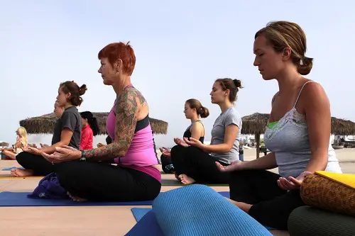 People sitting doing yoga