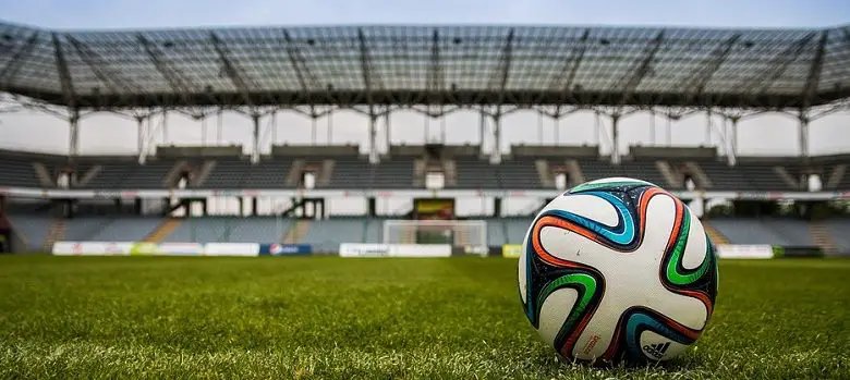 Football on a pitch in a football stadium