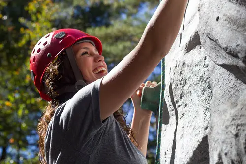 Woman using a climbing wall