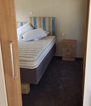 Accessible bedroom in caravan on Isle of Wight