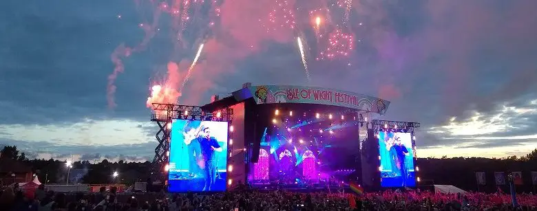 Isle of Wight festival stage at night with fireworks