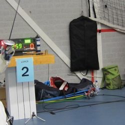 Two people wheelchair fencing