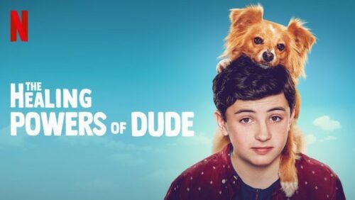 The Healing Powers of Dude TV show showing the words and a boy with a small dog on his shoulder