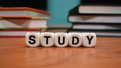 Word study on a wooden table spelt in scrabble letters