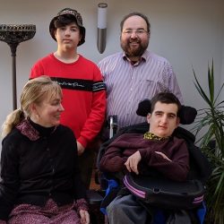 Duncan with his wife Clare and two sons