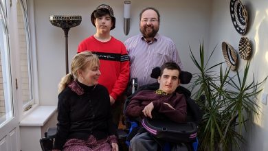 Duncan with his wife Clare and two sons