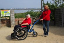 Two women using MT Push designed for both rider and pusher