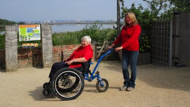 Two women using MT Push designed for both rider and pusher