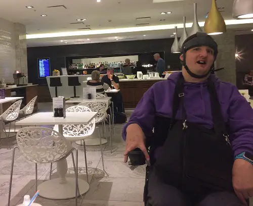 Simon in a restaurant on his cruise