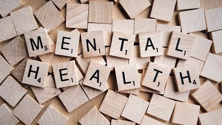 Words mental health spelt out in scrabble letters