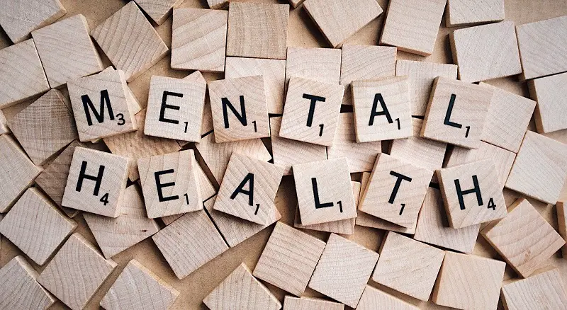 Words mental health spelt out in scrabble letters