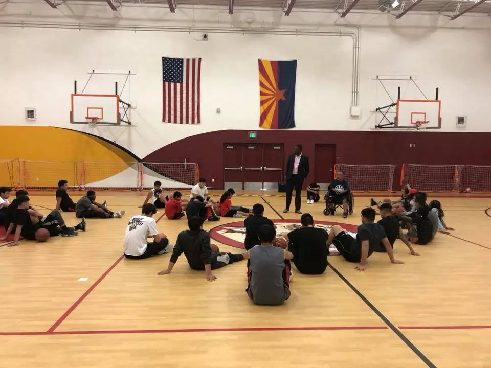 Disabled basketball coach shows students that “Anything is Possible