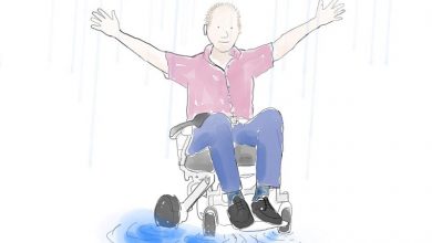 Cartoon of a man in a wheelchair with his arms in the air