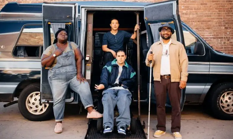 Sam, Mo, Scotty and Matt posing in front of the van
