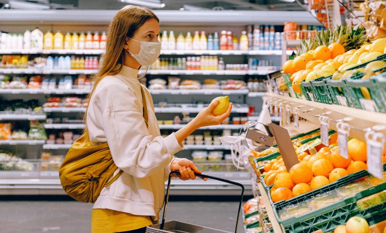 woman in grocery store with a mask on