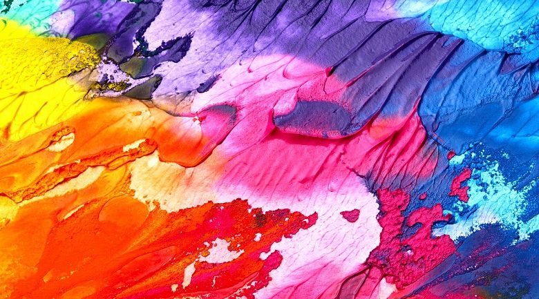 Blue, pink, red, orange and yellow paint swirled together