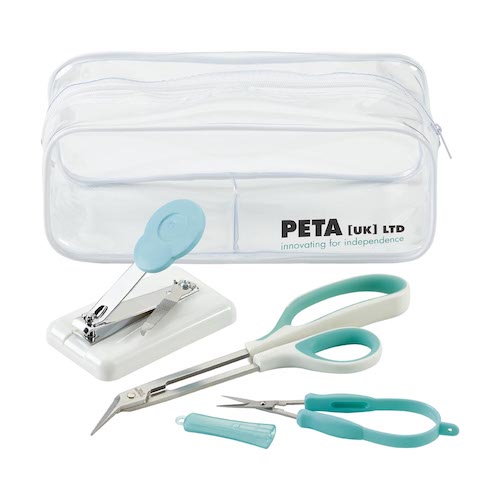 Peta nail care set on white background in front of a clear plastic storage bag