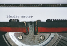 A typewriter has written Stories Matter - photo by Suzy Hazelwood