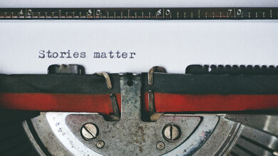 A typewriter has written Stories Matter - photo by Suzy Hazelwood